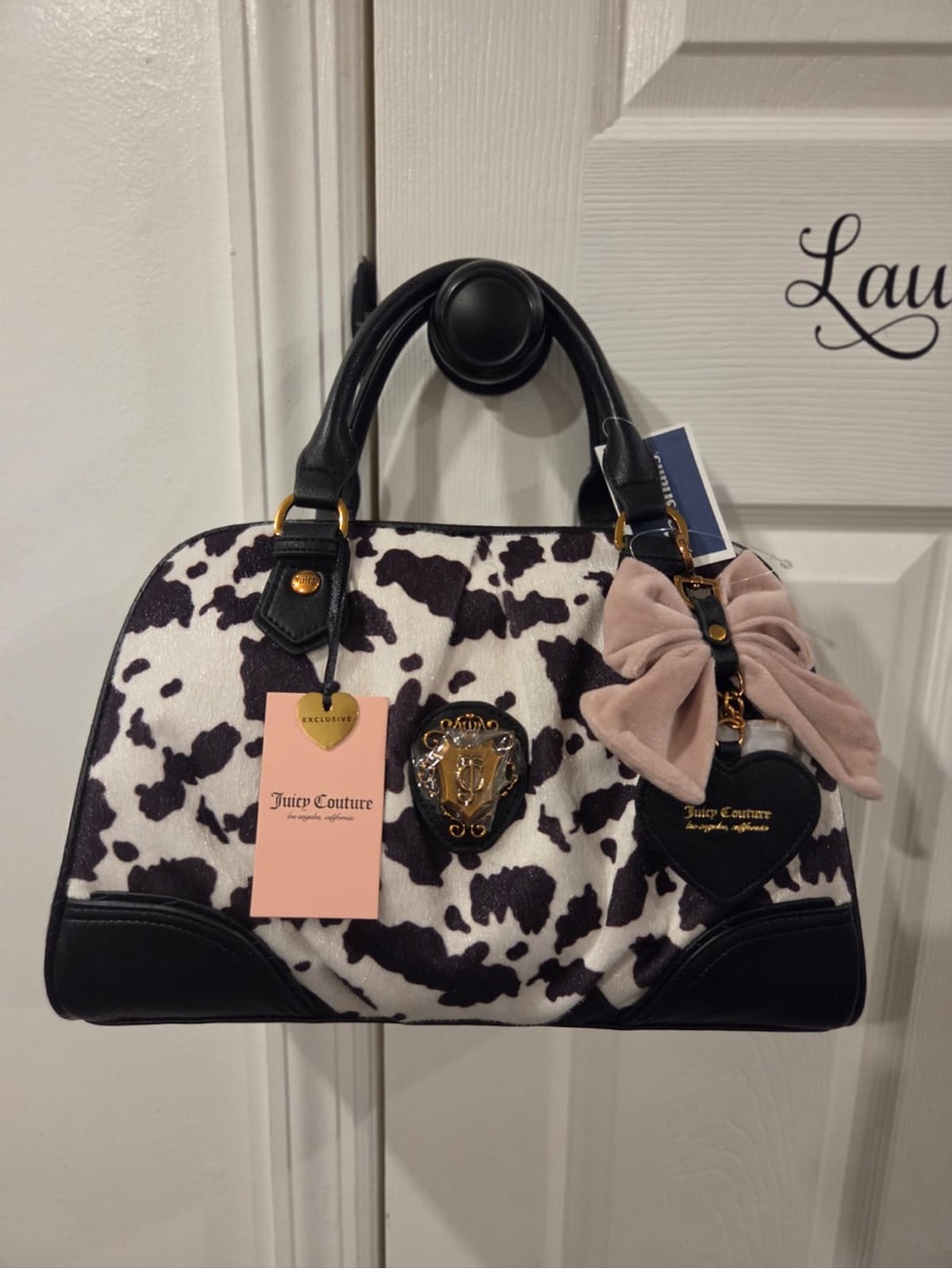 Juicy Couture Juicy Romance Cow Satchel
COLOR: LIQUORICE/ WHITE
